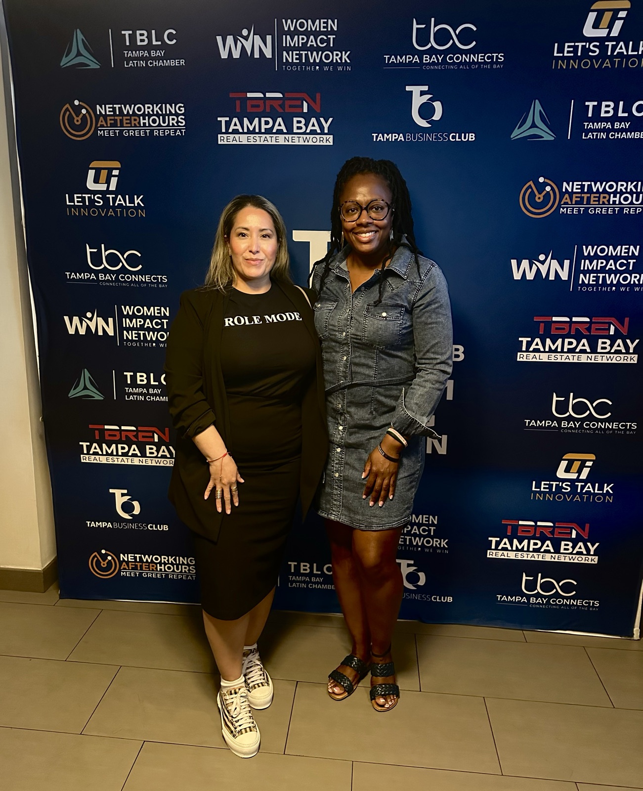 Role Models Foundation representative in a Role Model shirt at a Tampa Bay business networking event